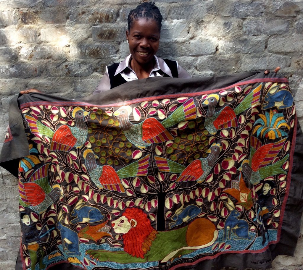Amazing Lion Hunt embroidered cloth by Sylvia Khubayi